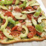 Tricolore pizza with basil oil