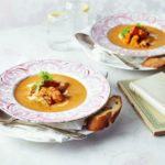 Seared garlic seafood with spicy harissa bisque