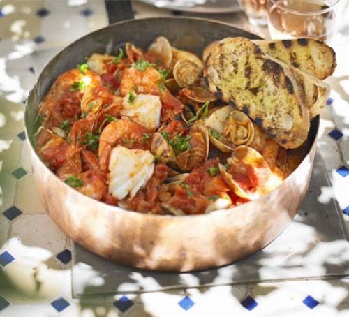 Mediterranean fish stew with garlic toasts