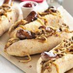 Maple-glazed hot dogs with mustardy onions