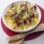Sticky chicken with mango couscous