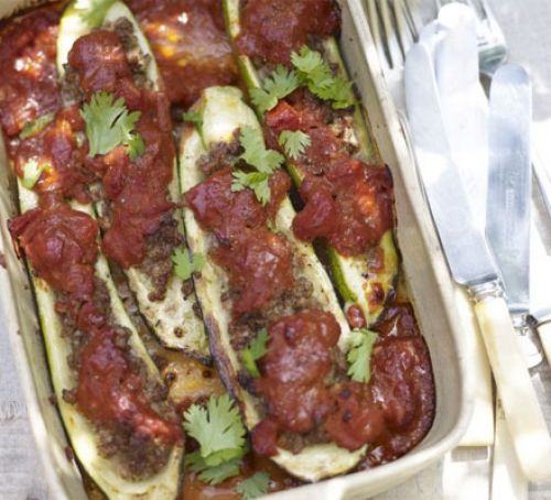 Baked courgettes stuffed with spiced lamb & tomato sauce