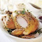 Mustard butter-basted roast turkey with bacon